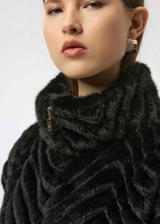 close up of plus size Joseph Ribkoff Chevron Faux Fur Mock Neck Zip Front Vest in Black