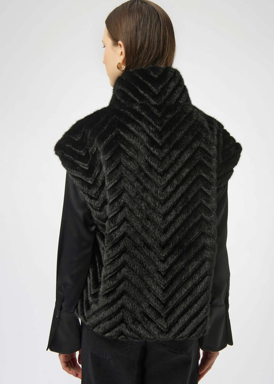 back view of plus size Joseph Ribkoff Chevron Faux Fur Mock Neck Zip Front Vest in Black
