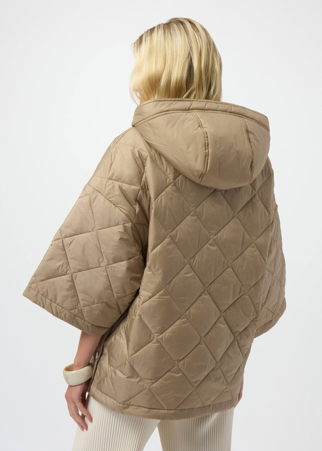 back view of plus size Joseph Ribkoff diamond quilted hooded Jacket in Gold