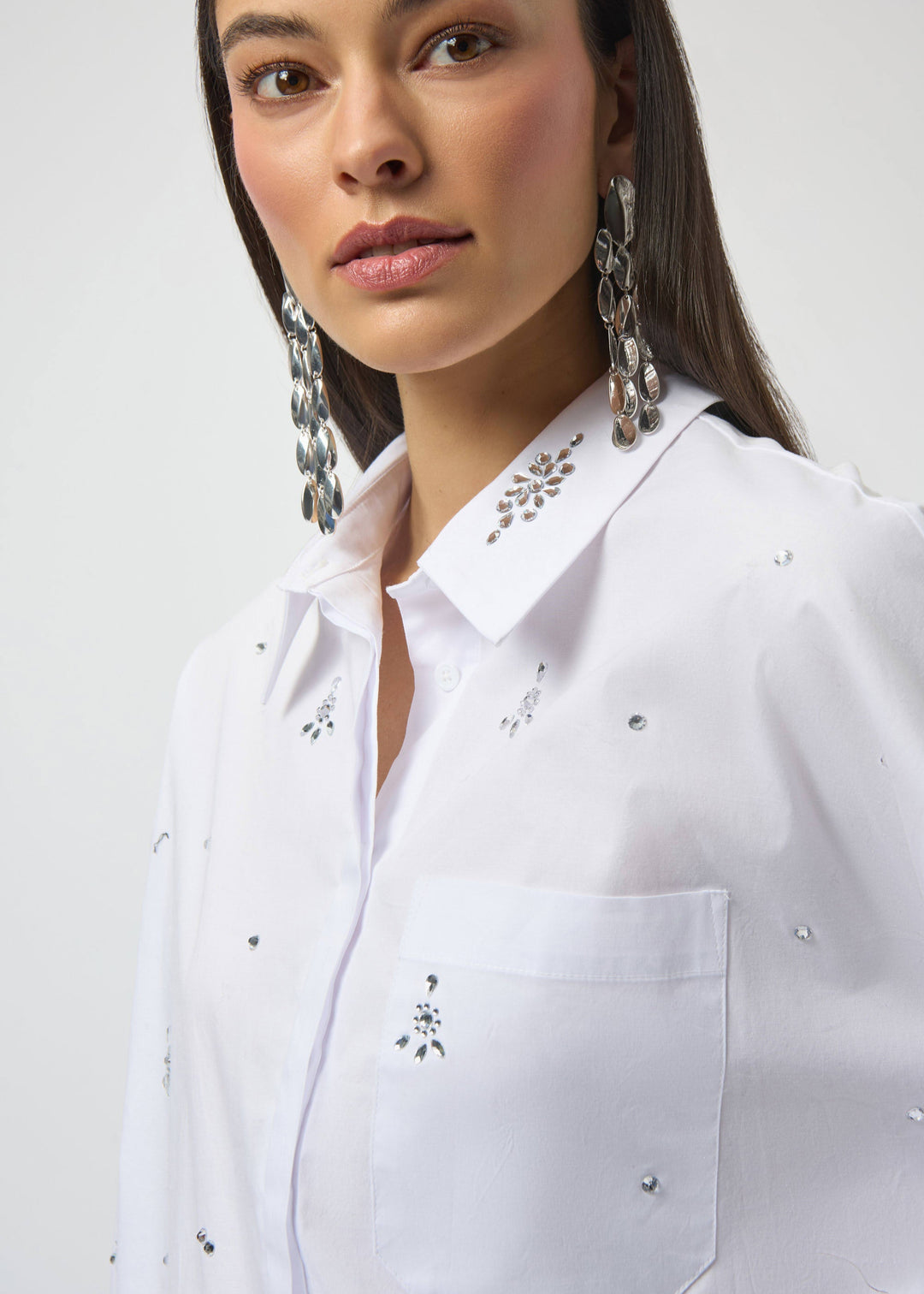 close up front view of plus size Joseph Ribkoff Stretch Poplin Boxy Blouse with Rhinestones in White