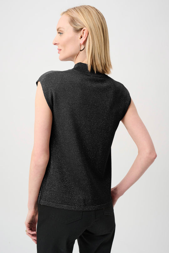 Black sleeveless mock-neck sweater, back view with dotted iron-on textured finish