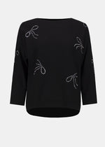 front view of plus size Joseph Ribkoff Knit Pullover with Bow Motif in Black
