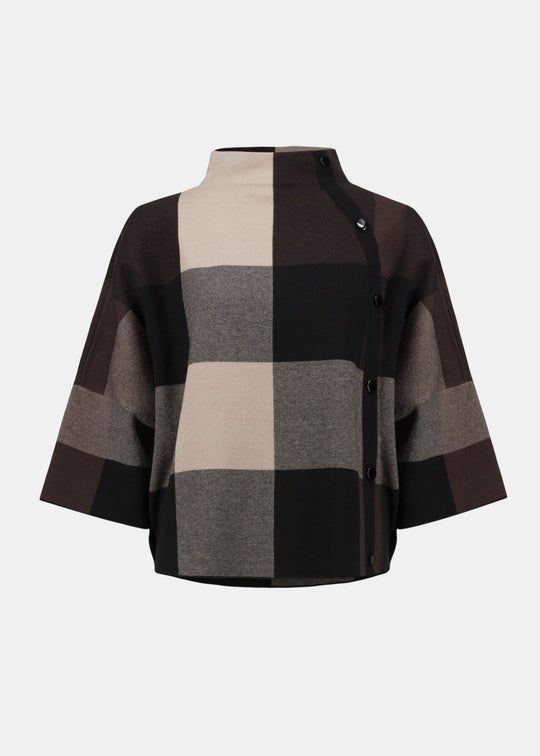 Plaid patterned poncho on a white background