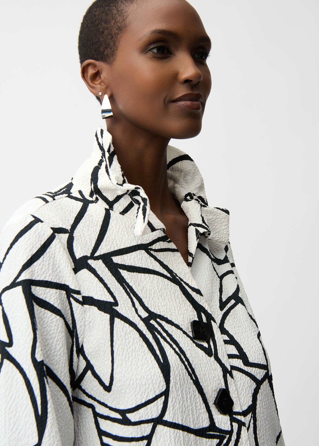 close up front view of plus size Joseph Ribkoff Seersucker Abstract Print Wire Collar Jacket in Vanilla Black