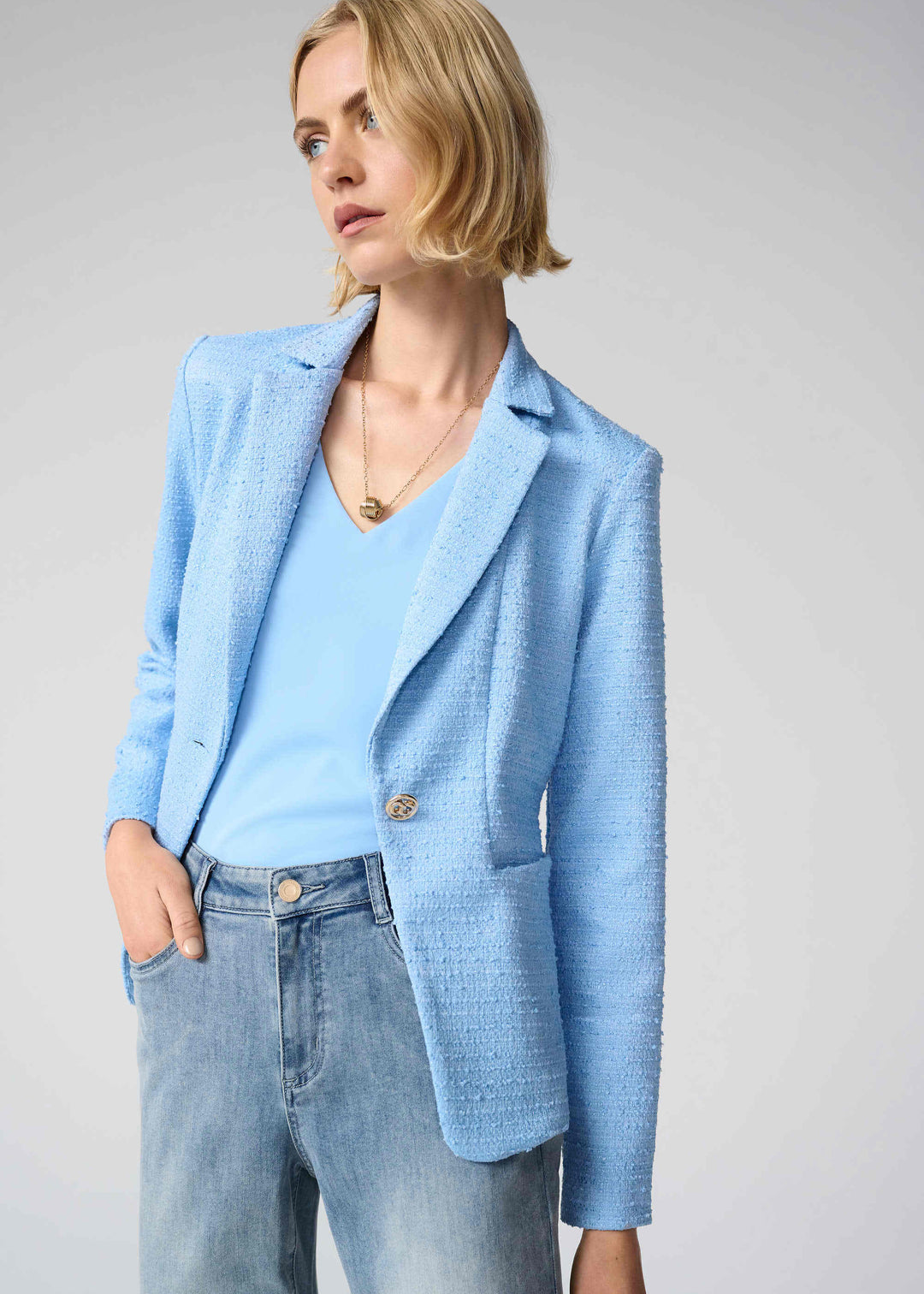 front view of plus size Joseph Ribkoff Woven Twill V-Neck double Layer Straight Tank in Sky Blue under jacket