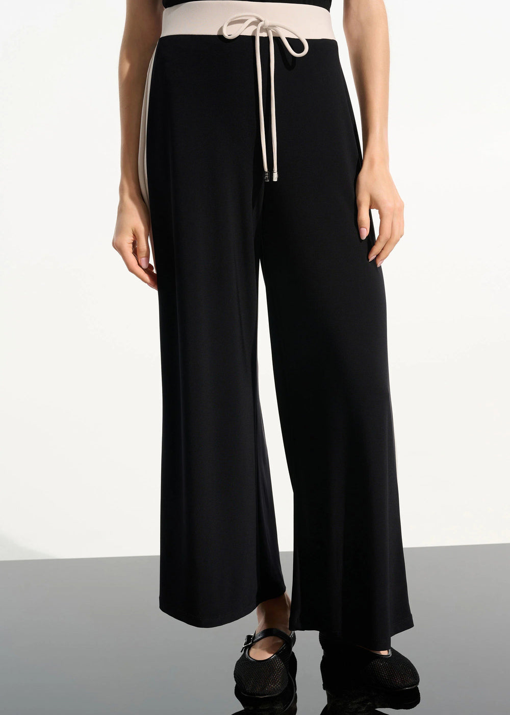 front view of plus size Joseph Ribkoff Silky Knit colour Block Pull On Pant with Drawstring in Black Moonstone