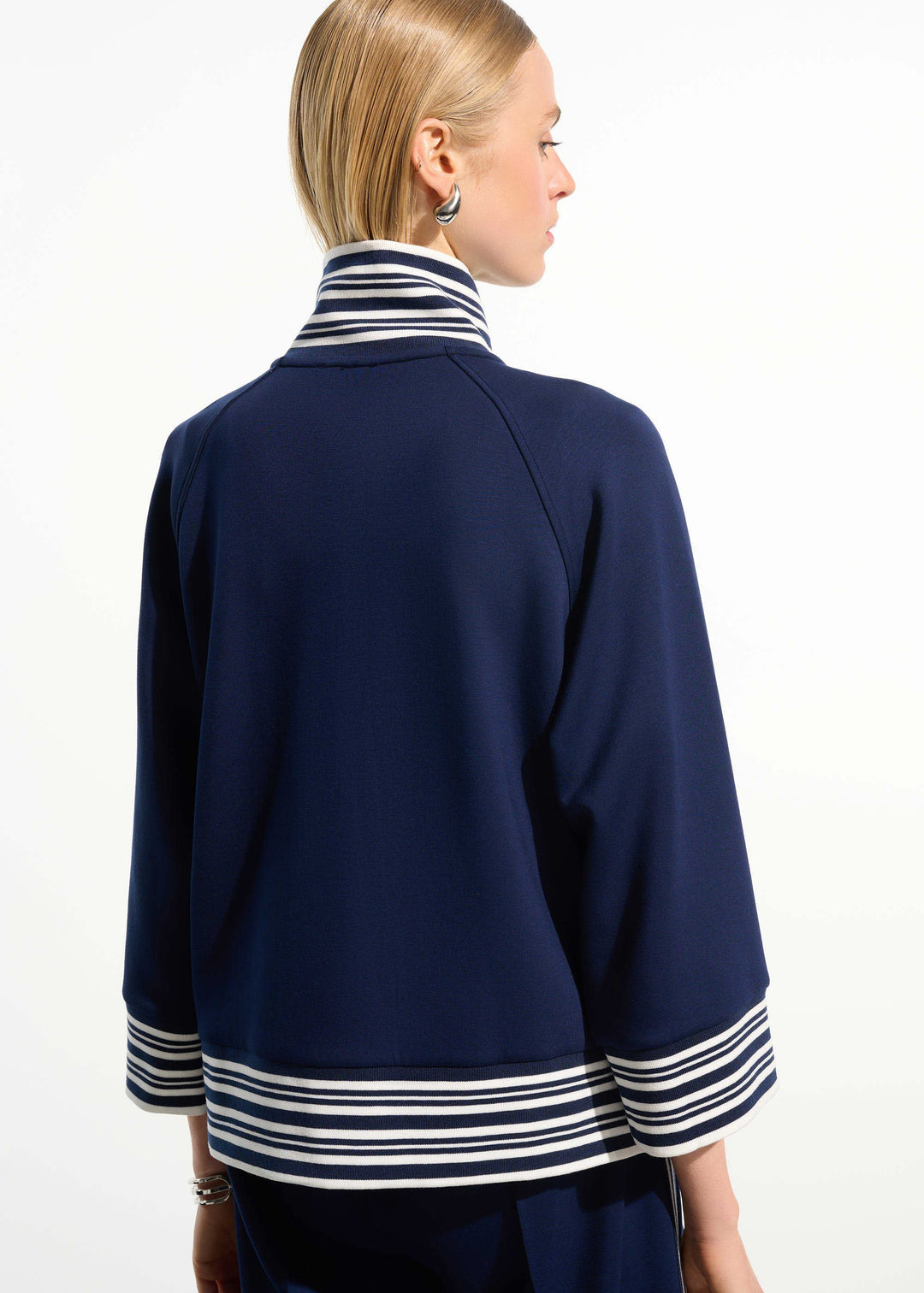 back view of plus size Joseph Ribkoff Scuba Jersey Stripe Trimmed Zip Jacket in Indigo