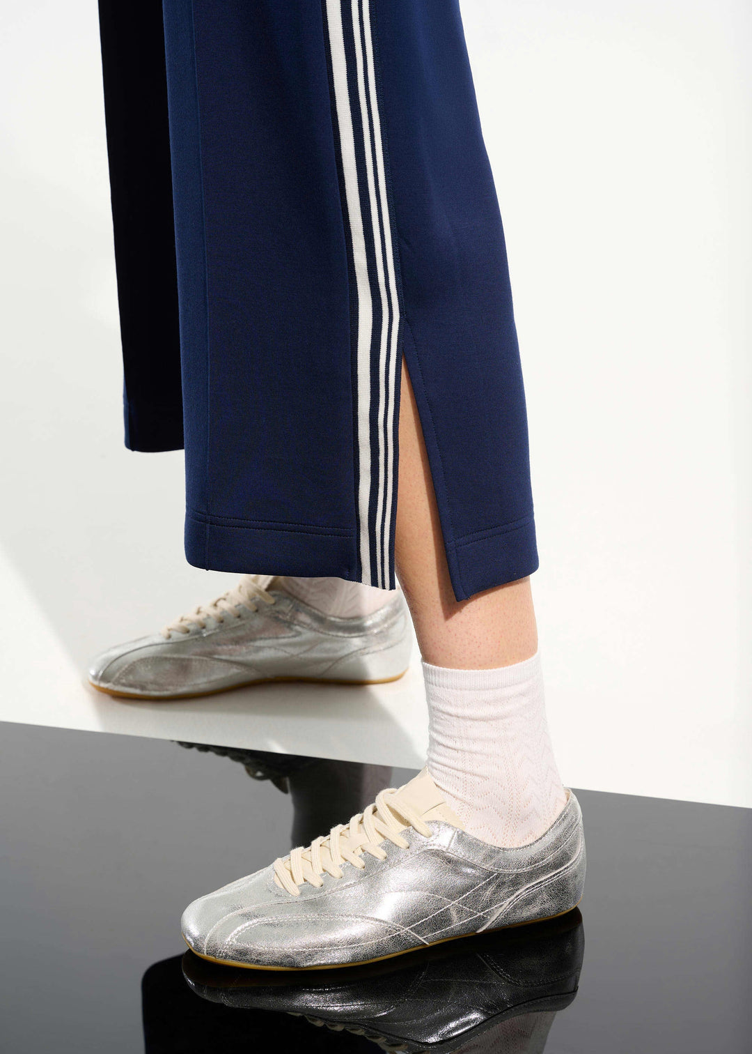 front view of plus size Joseph Ribkoff Scuba Jersey Culotte Pant with Side Stripe in Indigo