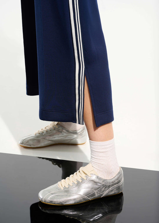 front view of plus size Joseph Ribkoff Scuba Jersey Culotte Pant with Side Stripe in Indigo