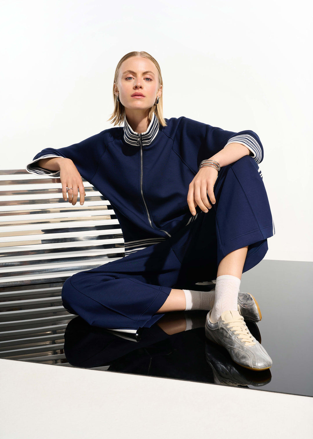 front view of plus size Joseph Ribkoff Scuba Jersey Culotte Pant with Side Stripe in Indigo