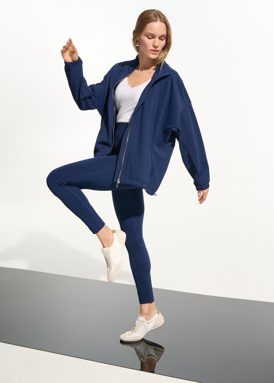 front view of plus size Joseph Ribkoff Nylon Spandex Compression Legging in Indigo