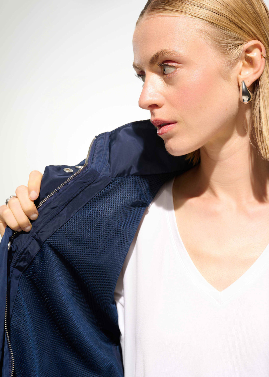 inside front view of plus size Joseph Ribkoff Memory Taffeta Waterproof Anorak in Indigo