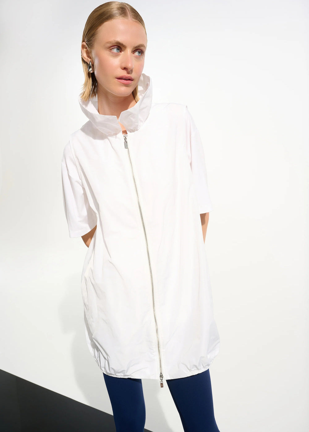 front view of plus size Joseph Ribkoff Zip Front Memory Taffeta Vest with Shirred Collar in White