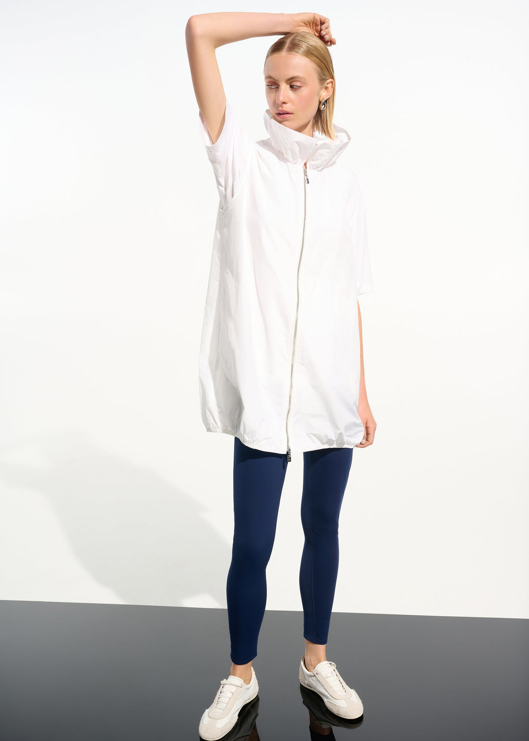 front view of plus size Joseph Ribkoff Zip Front Memory Taffeta Vest with Shirred Collar in White