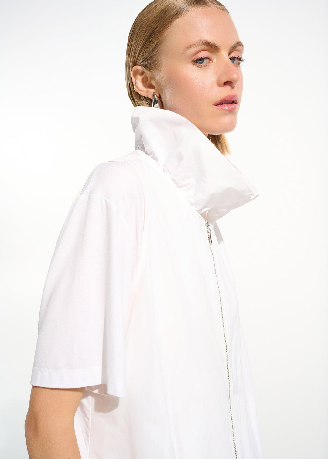 close up front view of plus size Joseph Ribkoff Zip Front Memory Taffeta Vest with Shirred Collar in White