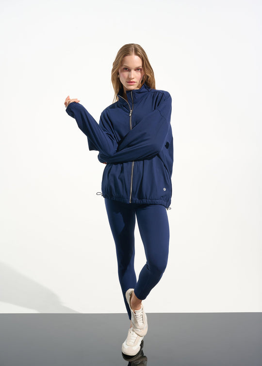 front view of plus size Joseph Ribkoff Stretch Nylon Boxy Mock Neck Jacket in Indigo