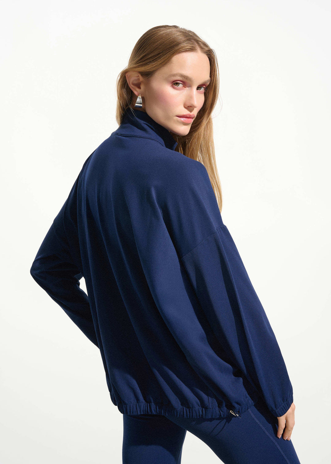 back view of plus size Joseph Ribkoff Stretch Nylon Boxy Mock Neck Jacket in Indigo