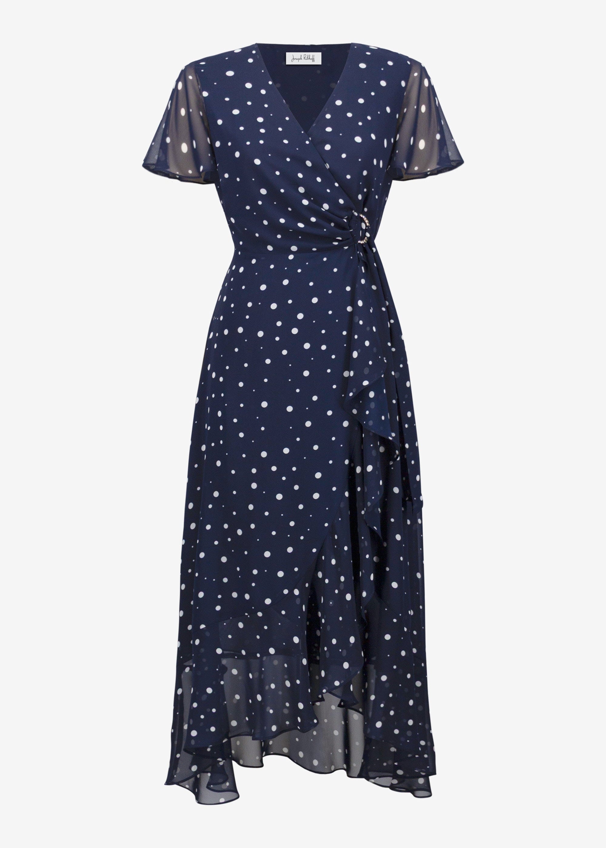 Navy dress with white star pattern on a white background