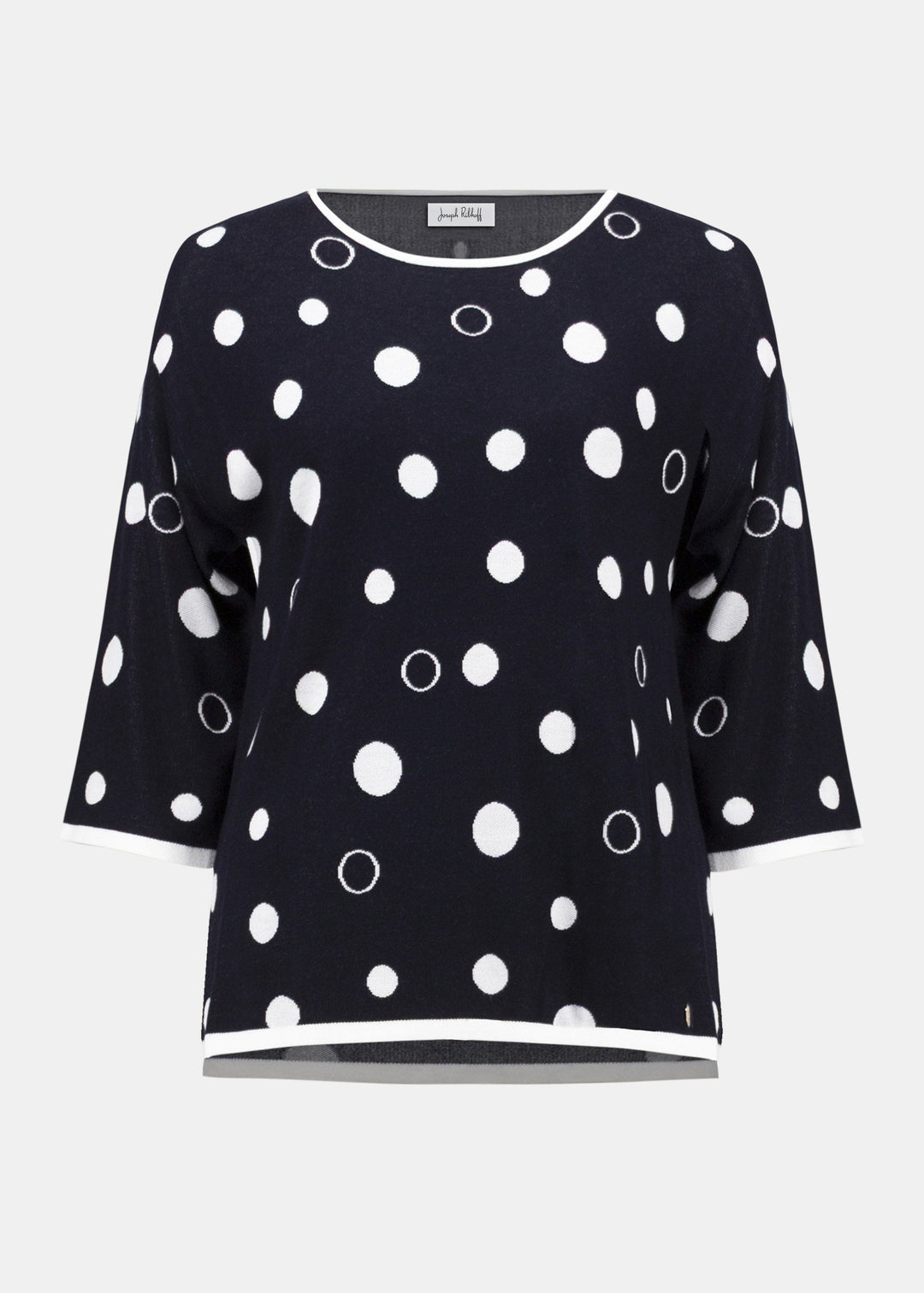 Black top with white polka dot pattern on a white background