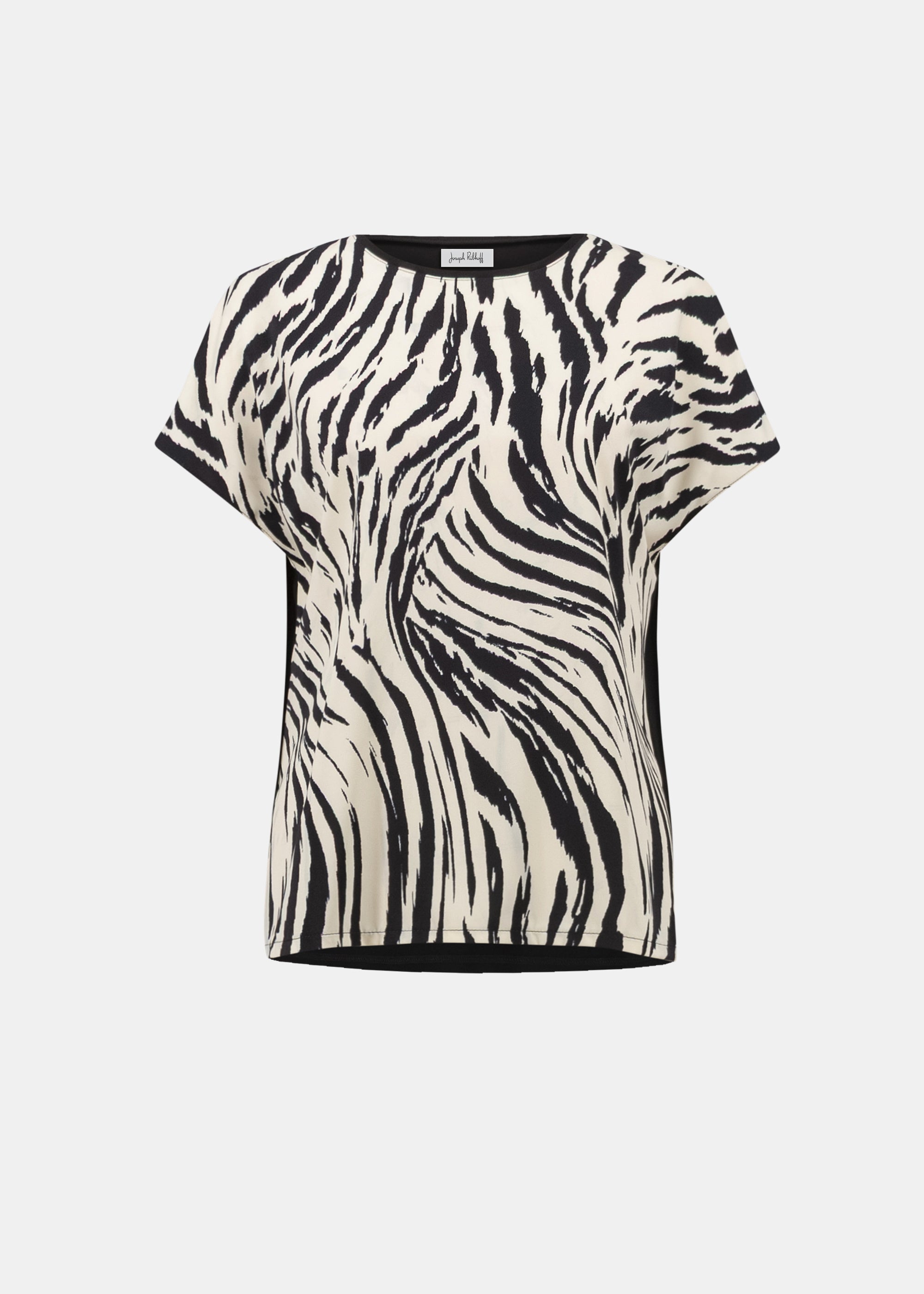 Zebra print top on a white background