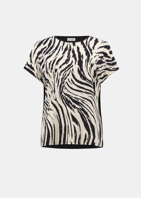 Zebra print top on a white background