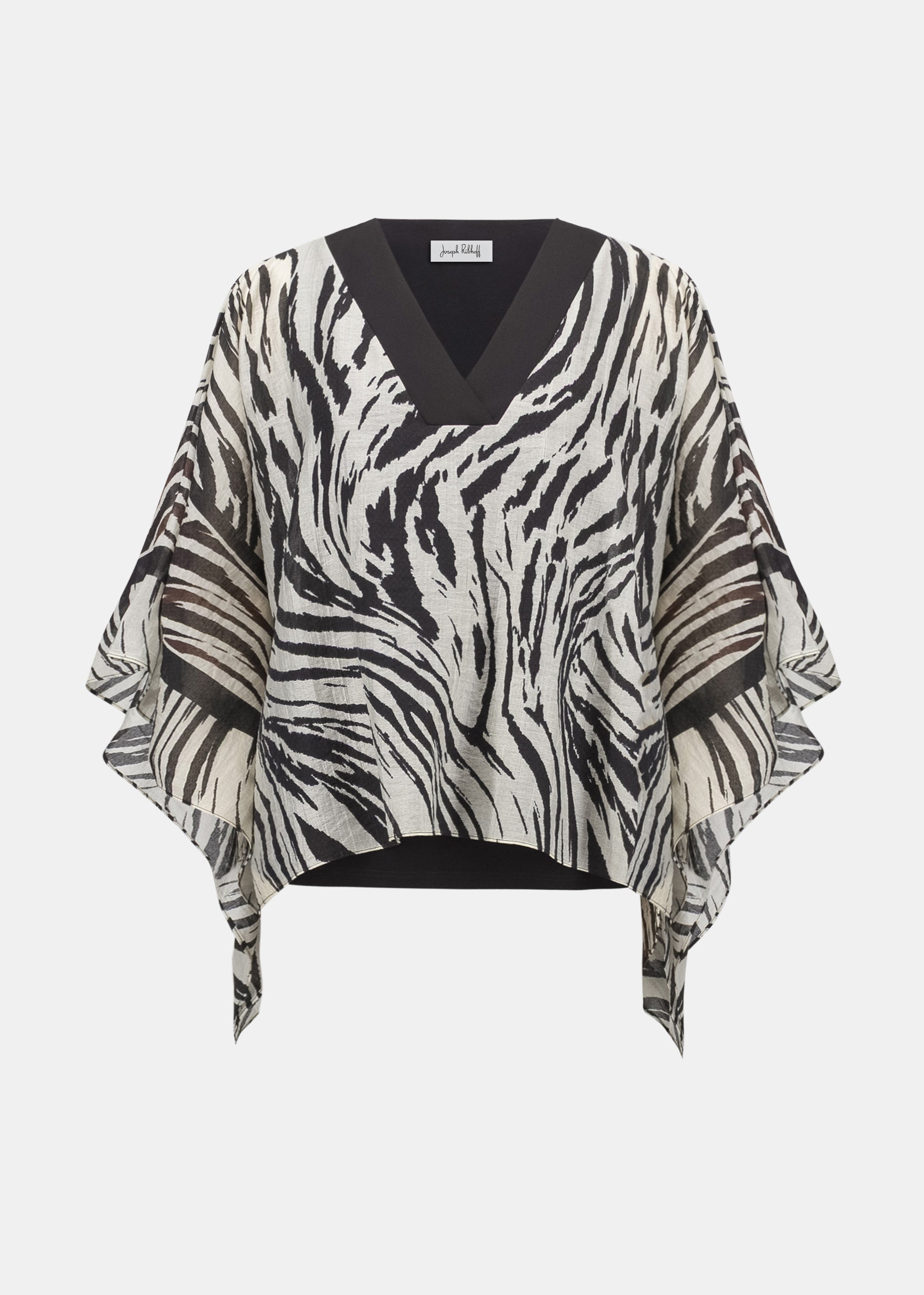 Zebra print poncho on a white background