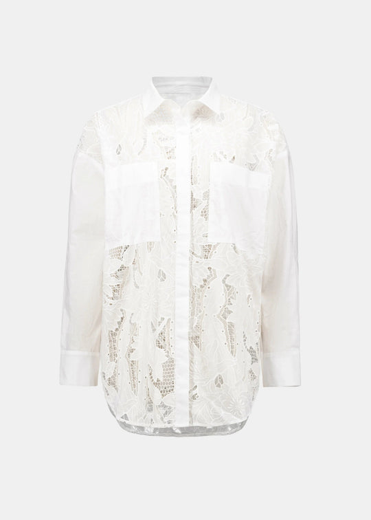 White lace blouse on a white background