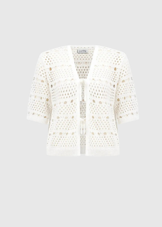 White lace cardigan on a light gray background