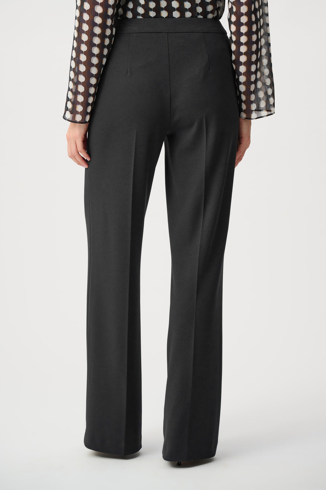 Black wide-leg crepe pants with straight wide legs and pressed center front seams