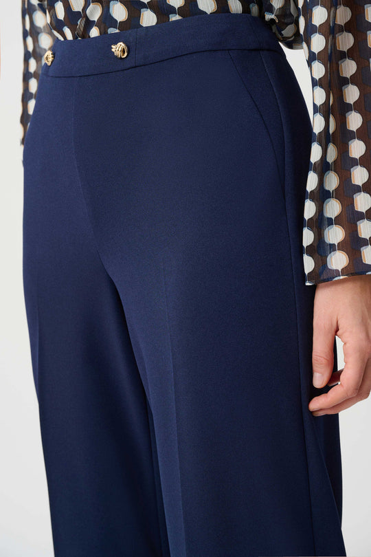 Joseph Ribkoff indigo wide-leg pants close-up at waistband with gold button