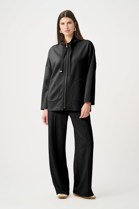 Black boxy zip jacket with funnel neck and drawstring, three-quarter sleeves