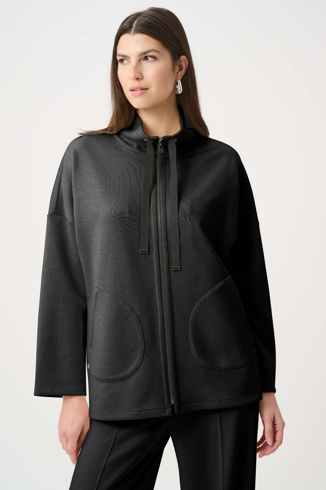 Black scuba jersey jacket with funnel neck, zip front, drawstring, and patch pockets