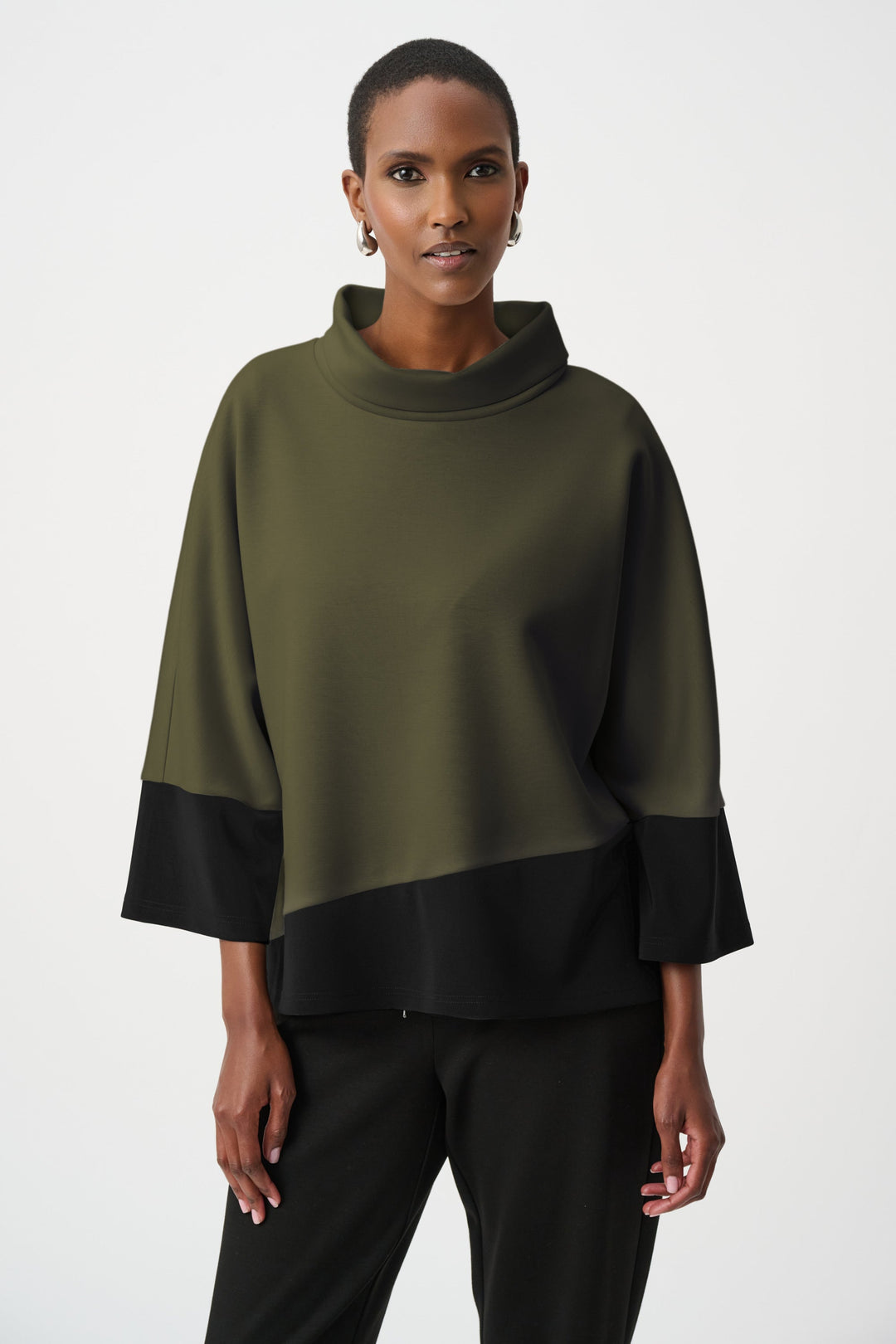 Color block trapeze top with cowl neck in olive green and black worn by model