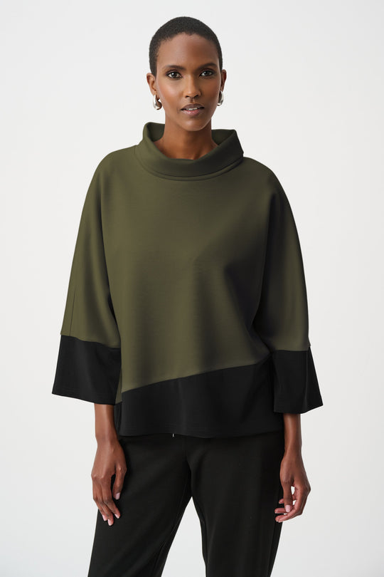 Color block trapeze top with cowl neck in olive green and black worn by model