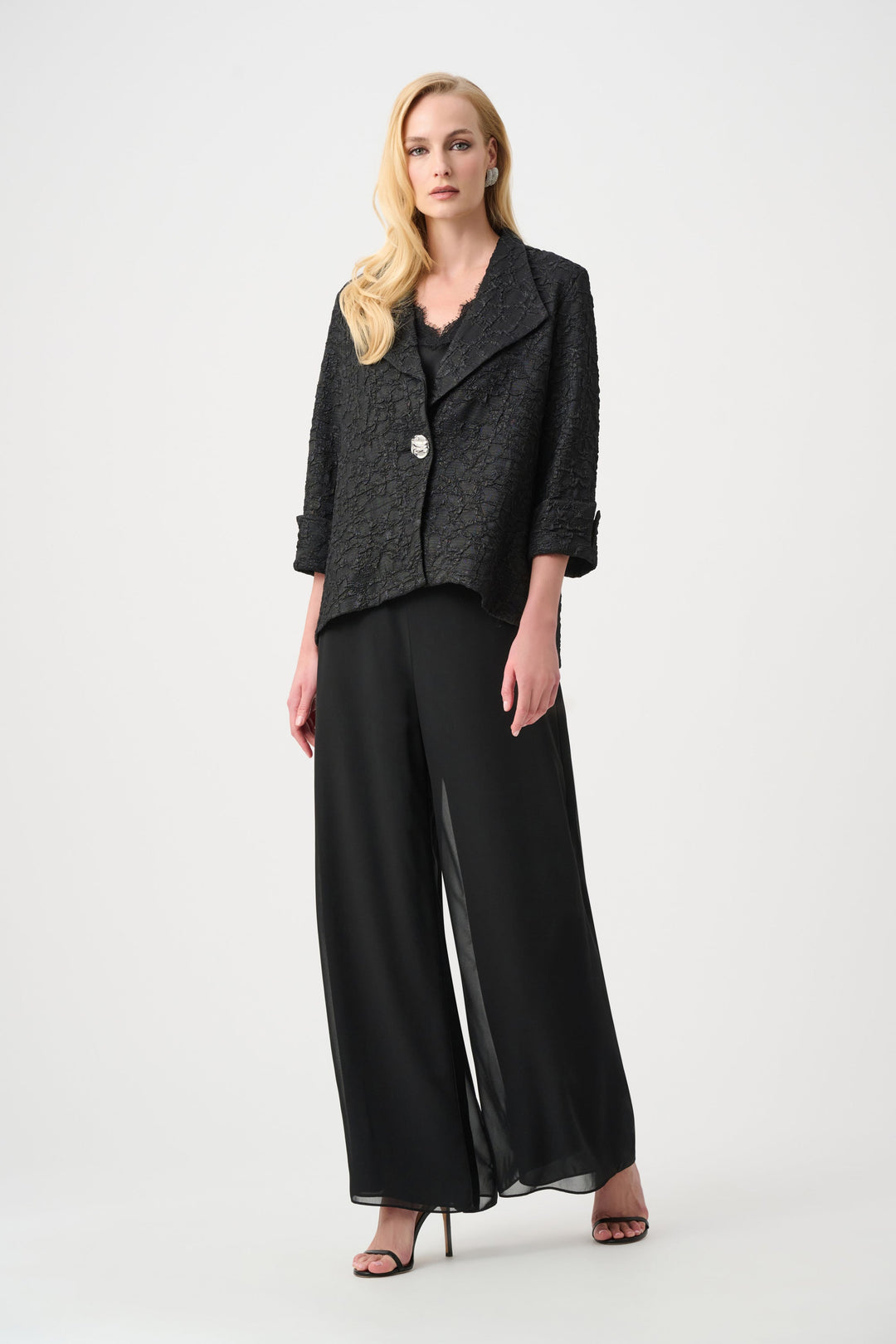 Black textured jacquard trapeze jacket with single button closure and wide leg pants