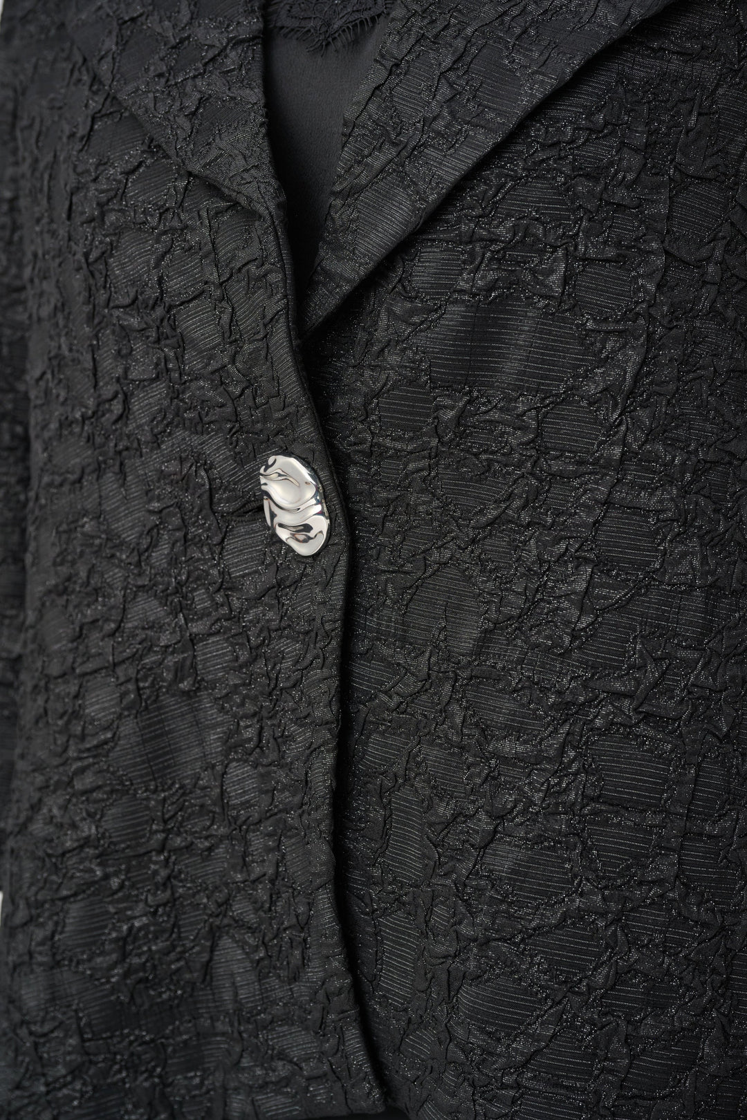Black textured jacquard jacket with lurex detail and decorative button closure