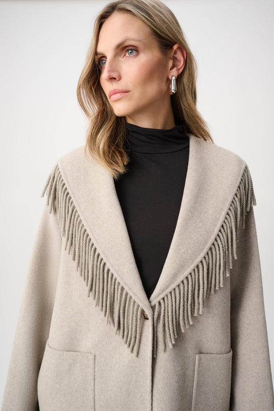 Oatmeal shawl-collar coat with long fringe trim and dual front pockets