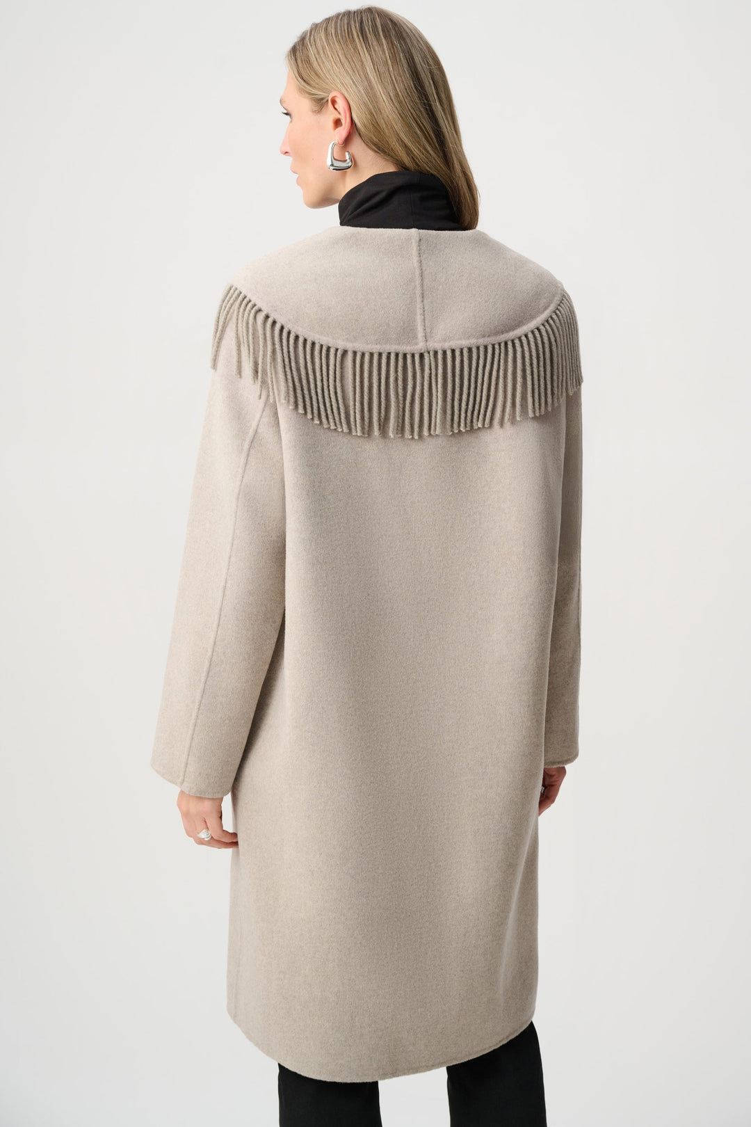 Oatmeal longline coat back view with fringe trim on the collar