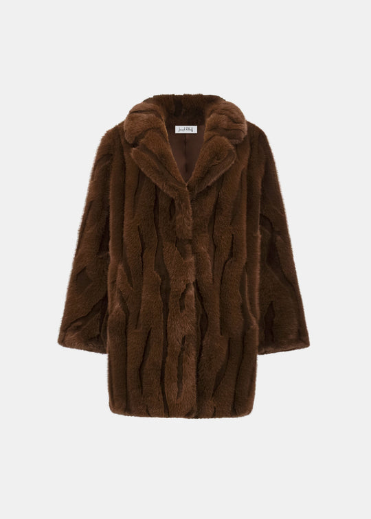 Brown fur coat on a white background