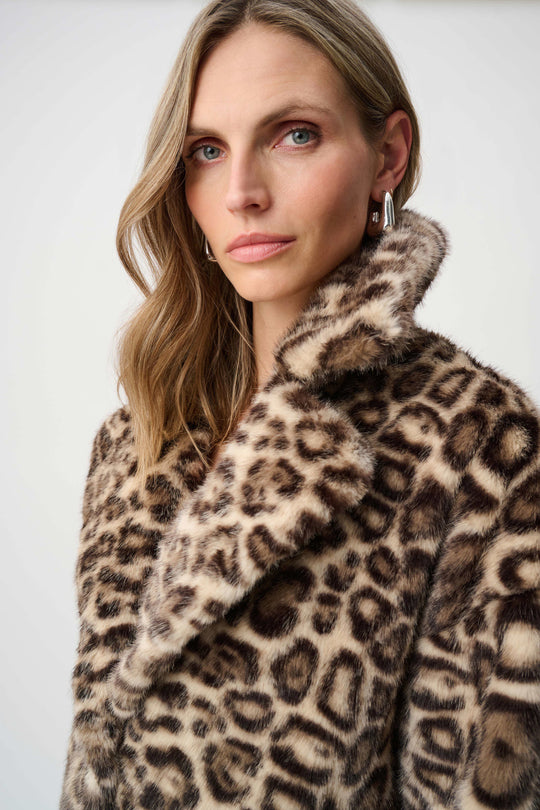 Leopard print faux fur coat close-up with raised collar and button placket