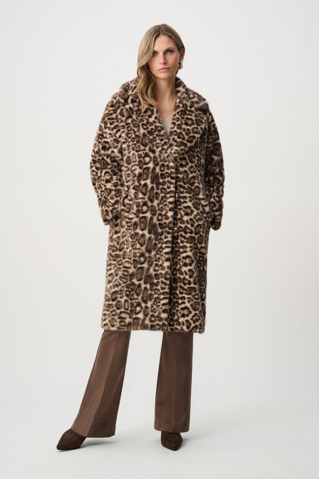 Leopard print faux fur coat with long sleeves, button front, and mid-length hem