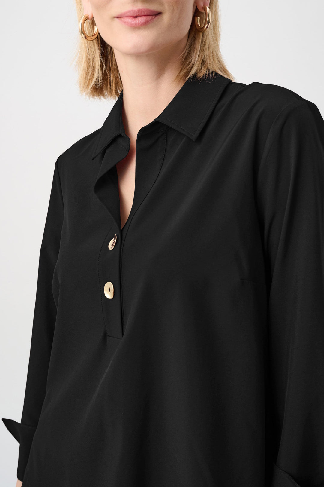 Black poplin shirt collar top with open V neckline and gold button half placket