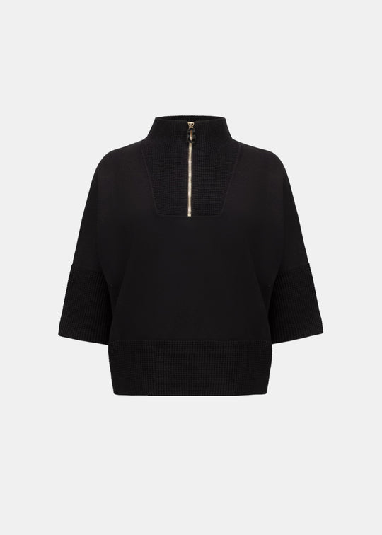Black zip funnel-neck sweater with 3/4 sleeves and gold-tone zipper