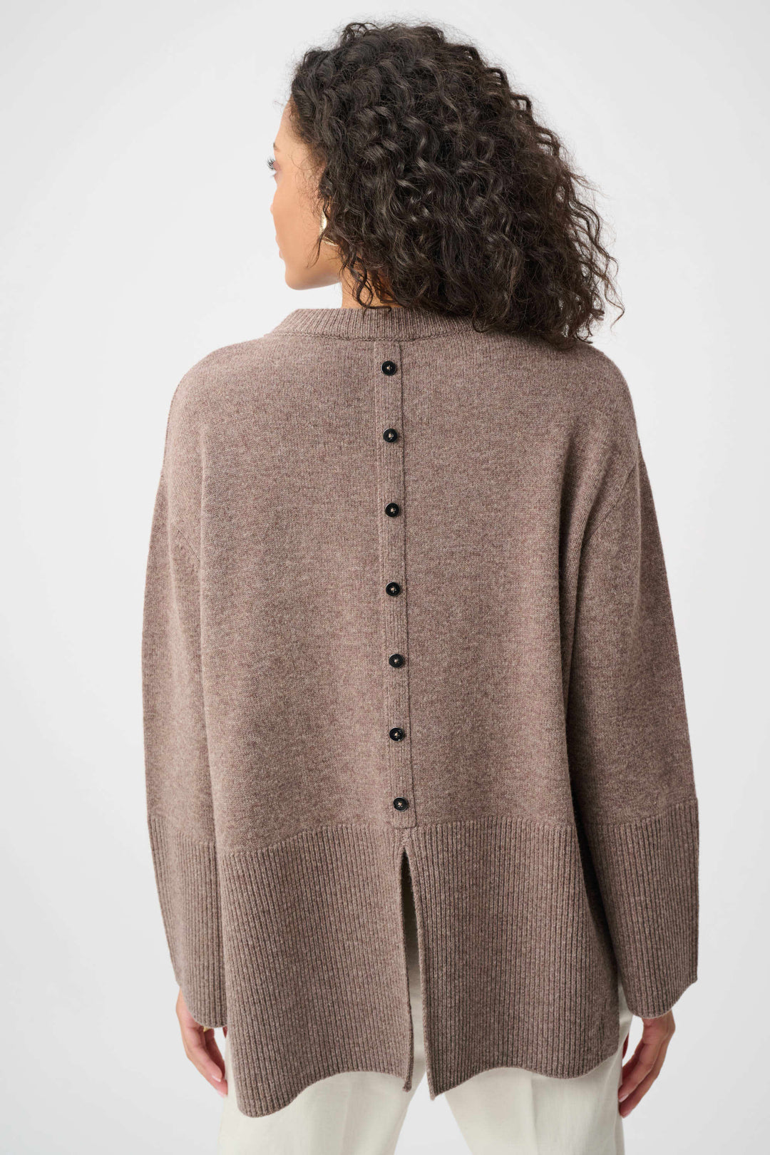 Mink wool crewneck sweater with button-back closure and side slit opening