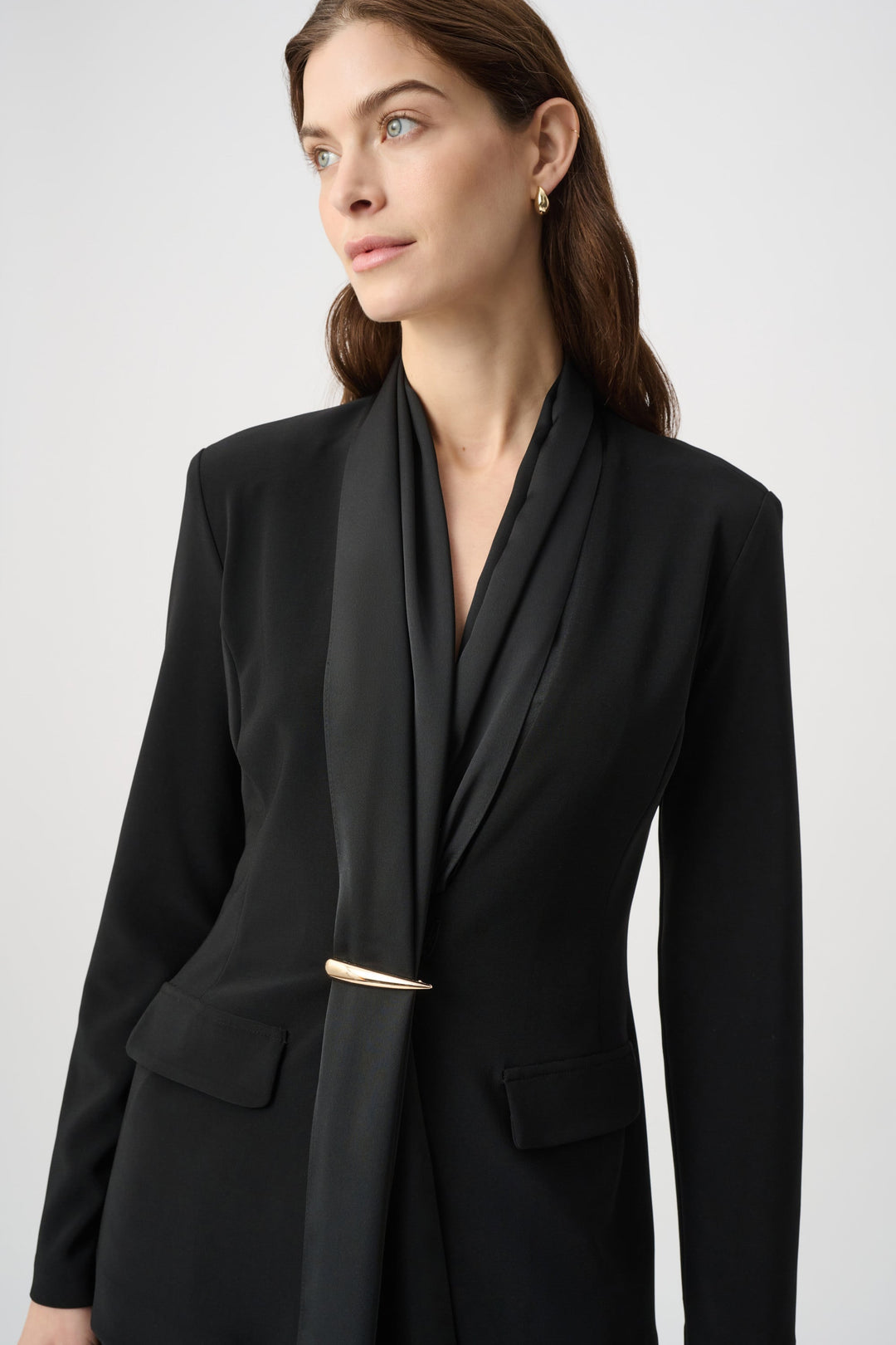 Black scarf-collar jacket with gold bar detail and welt pockets
