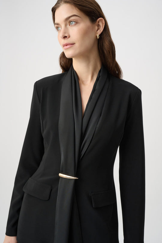 Black scarf-collar jacket with gold bar detail and welt pockets