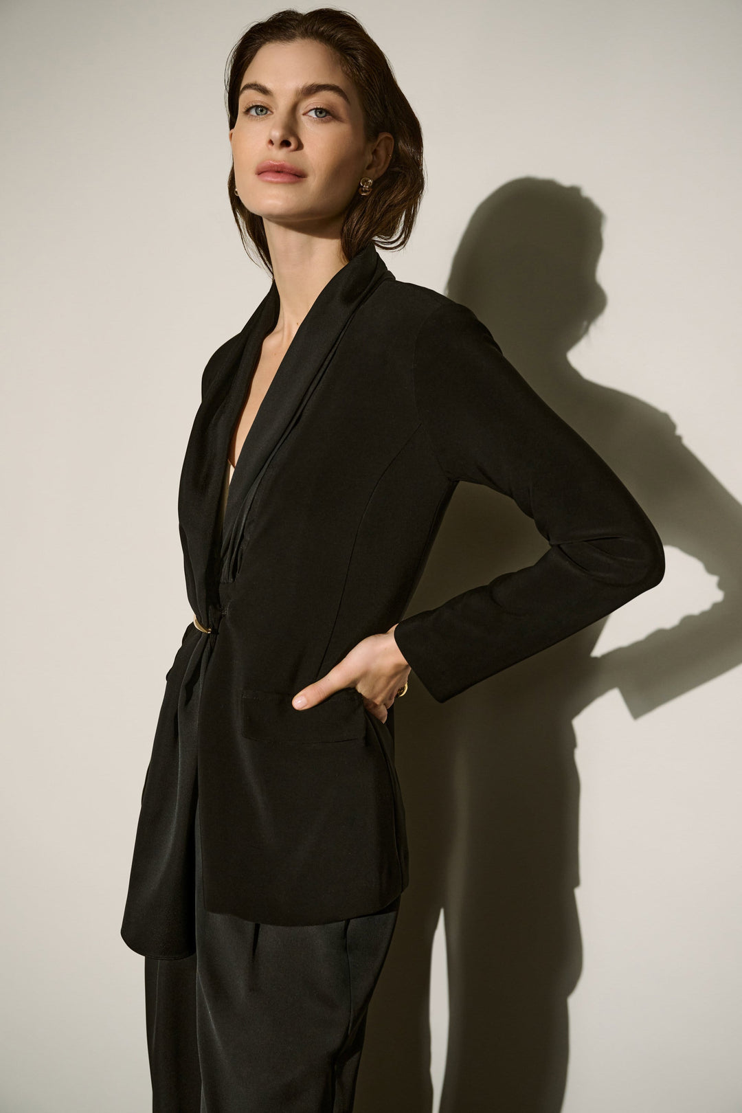 Black scarf-collar blazer jacket with draped front and flap pockets