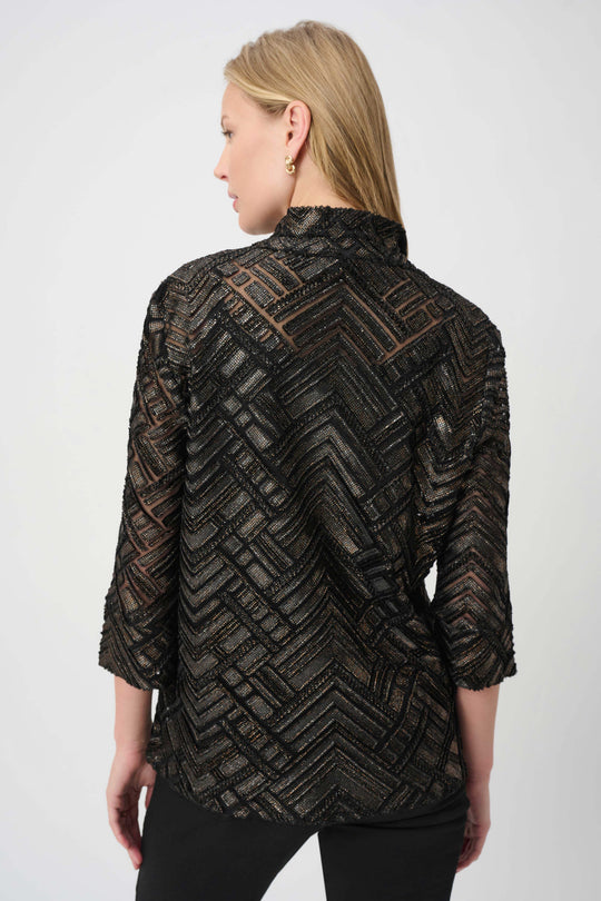 Women's black-and-bronze burnout trapeze jacket, back view with chevron-like pattern