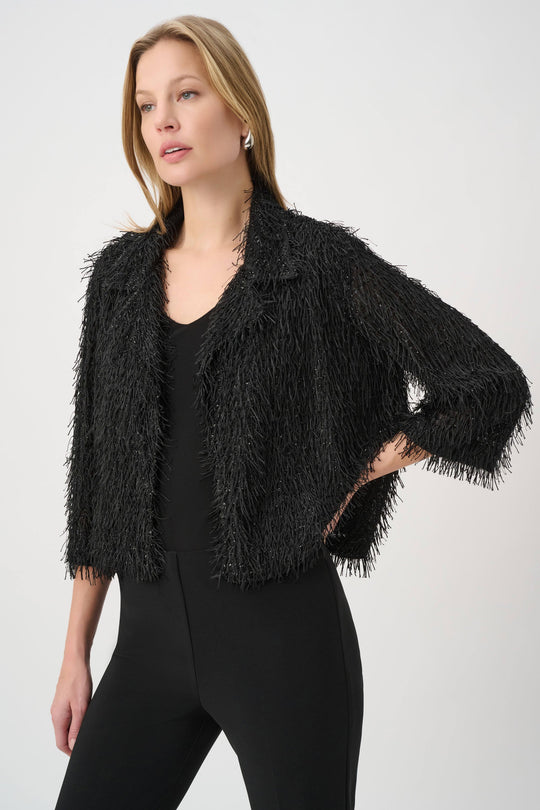 Black fringed short jacket with three-quarter sleeves, open V-neck front