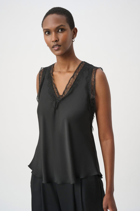 Black satin sleeveless V-neck tank with layered hem and lace trim